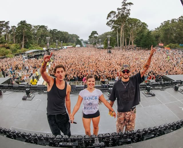 Laszewo on stage in front of a huge festival crowd
