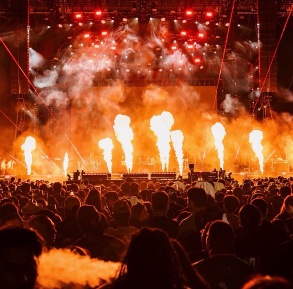 Flame jets firing across the Belicofest stage over a packed crowd